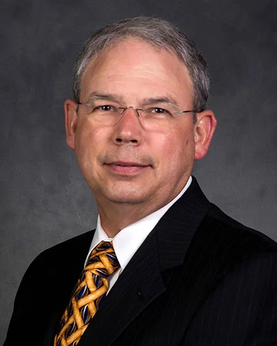 Professional man in suit with glasses, portrait.