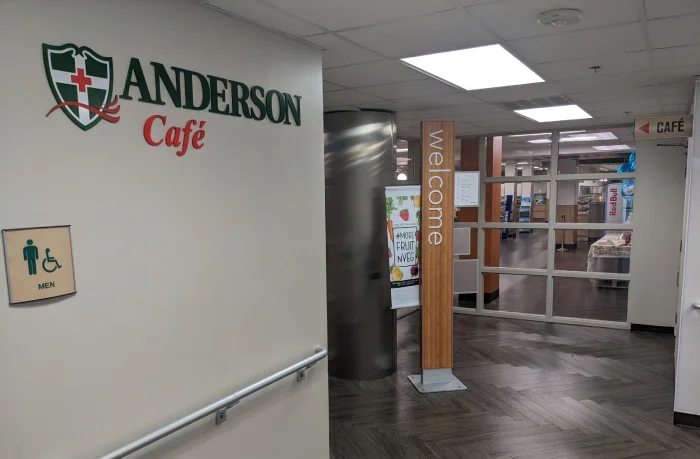 Interior of Anderson Cafe with welcome sign.